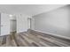 Bright bedroom features modern gray flooring and a neutral color palette throughout at 2451 N Rainbow Blvd # 2144, Las Vegas, NV 89108