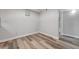 A sunlit bedroom with wood-look floors provides a serene and comfortable living space at 2451 N Rainbow Blvd # 2144, Las Vegas, NV 89108