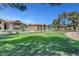 Expansive green space with picnic tables, ideal for community events and enjoying the outdoors at 2451 N Rainbow Blvd # 2144, Las Vegas, NV 89108