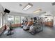 Bright community gym with treadmills, elliptical machines, stationary bikes, and mirrored walls at 2451 N Rainbow Blvd # 2144, Las Vegas, NV 89108