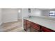 Bright kitchen featuring wood cabinets, granite countertops, and an open layout for easy entertaining at 2451 N Rainbow Blvd # 2144, Las Vegas, NV 89108