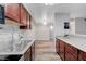 Open concept kitchen design with stainless appliances, wood cabinets, and ample counter space at 2451 N Rainbow Blvd # 2144, Las Vegas, NV 89108