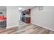Kitchenette features wood cabinets and breakfast bar with red bar stools at 2451 N Rainbow Blvd # 2144, Las Vegas, NV 89108