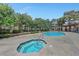 Community pool area featuring a hot tub, providing residents with a refreshing oasis and relaxation at 2451 N Rainbow Blvd # 2144, Las Vegas, NV 89108