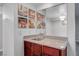 Wet bar has a granite-look counter, stainless steel sink, and custom art at 2451 N Rainbow Blvd # 2144, Las Vegas, NV 89108