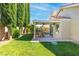 Large backyard with covered patio, providing ample space for outdoor enjoyment at 2708 Norbeck St, Las Vegas, NV 89117