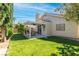Expansive backyard featuring a covered patio perfect for entertaining or relaxing at 2708 Norbeck St, Las Vegas, NV 89117