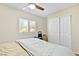 Bedroom featuring a window with shutters, ceiling fan and a closet at 2708 Norbeck St, Las Vegas, NV 89117