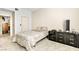 Bedroom featuring neutral tones, carpet flooring and a three drawer dresser at 2708 Norbeck St, Las Vegas, NV 89117