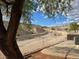 A backyard with desert landscaping, a fence, and a scenic desert mountain view at 3349 Partridge Run St, Laughlin, NV 89029