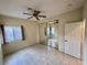Bedroom featuring tile floors, mirrored closet and window views at 3349 Partridge Run St, Laughlin, NV 89029