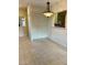 Bright dining area featuring neutral colors and a modern chandelier at 3349 Partridge Run St, Laughlin, NV 89029