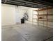 The garage has storage shelves, a water heater, and a water softener at 3349 Partridge Run St, Laughlin, NV 89029