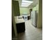Functional kitchen features ample counter space, bright green cabinets, and white appliances at 3349 Partridge Run St, Laughlin, NV 89029