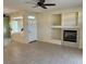 Open living area with tile flooring, fireplace, and lots of natural light at 3349 Partridge Run St, Laughlin, NV 89029