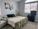 Bedroom featuring neutral tones and a window with natural lighting at 3400 Denali Preserve St, Las Vegas, NV 89122