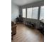 Living room with natural light, a desk, and wooden-look floors at 3400 Denali Preserve St, Las Vegas, NV 89122