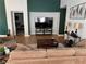 Inviting living room with a cozy brown sofa, sleek coffee table, and stylish decor at 3400 Denali Preserve St, Las Vegas, NV 89122