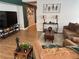Relaxing living area with open layout and stylish furnishings on wood-look floors at 3400 Denali Preserve St, Las Vegas, NV 89122