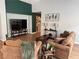 Comfortable living room showcasing modern decor and wood-look floors at 3400 Denali Preserve St, Las Vegas, NV 89122