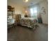 Cozy bedroom with bright natural light, featuring a decorative bookshelf at 3534 Alpheus River Ave, Las Vegas, NV 89106