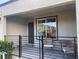Front patio with chairs and table at 3534 Alpheus River Ave, Las Vegas, NV 89106