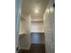 A walk-in closet complete with shelving and lighting provides ample storage space at 3534 Alpheus River Ave, Las Vegas, NV 89106