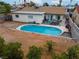 Aerial view of the backyard featuring a sparkling in-ground pool and spacious patio area at 3661 Margarita Way, Las Vegas, NV 89103
