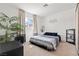 Cozy bedroom featuring neutral tones, comfortable bedding, and closet with sliding doors at 3661 Margarita Way, Las Vegas, NV 89103