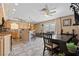 Open-concept kitchen and dining area with access to living room and abundant natural light at 3661 Margarita Way, Las Vegas, NV 89103