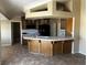 Kitchen with tiled countertops and wood cabinets at 3750 S Rainbow Ave, Pahrump, NV 89048