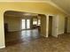 Spacious living room featuring a fireplace and access to the backyard through double glass doors at 3750 S Rainbow Ave, Pahrump, NV 89048