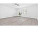 Bright bedroom with large window and gray floors at 3805 San Angelo Ave, Las Vegas, NV 89102