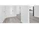 Bright entryway featuring wood-look flooring with open access to other living spaces at 3805 San Angelo Ave, Las Vegas, NV 89102