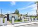 Lovely single-story house with well-kept lawn, mature trees, and a secure gated entrance at 3805 San Angelo Ave, Las Vegas, NV 89102