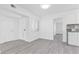Charming kitchen leading to a bright living space, with new flooring and a fresh, clean look at 3805 San Angelo Ave, Las Vegas, NV 89102