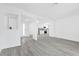 Open-concept living area with new flooring, modern paint, and easy access to the kitchen at 3805 San Angelo Ave, Las Vegas, NV 89102