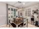 Cozy dining area with stylish lighting, perfect for Gathering meals and entertaining guests at 39 Castleton Tower Ct, Henderson, NV 89011