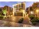 Charming two-story home with a two-car garage and landscaped front yard at 39 Castleton Tower Ct, Henderson, NV 89011
