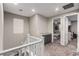 Upstairs landing with built-in cabinet and carpet floors at 39 Castleton Tower Ct, Henderson, NV 89011