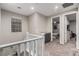 Hallway with built-in cabinetry and carpeting at 39 Castleton Tower Ct, Henderson, NV 89011