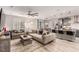 Spacious open-concept living room and kitchen featuring modern decor and ample natural light at 39 Castleton Tower Ct, Henderson, NV 89011