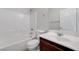 Bright bathroom features a tub, shower, vanity, and fixtures at 4078 Blue Manor Ln, North Las Vegas, NV 89032