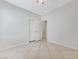 Bedroom with tile floor, walk-in closet, and open doorway at 4078 Blue Manor Ln, North Las Vegas, NV 89032