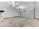 Spacious two-car garage with ample room for parking and storage at 4078 Blue Manor Ln, North Las Vegas, NV 89032