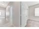 Hallway view with access to bedrooms and living areas at 4078 Blue Manor Ln, North Las Vegas, NV 89032