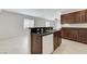 Open kitchen featuring stainless steel sink and granite counters at 4078 Blue Manor Ln, North Las Vegas, NV 89032