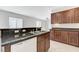 Kitchen showcasing stainless steel sink and granite counters at 4078 Blue Manor Ln, North Las Vegas, NV 89032