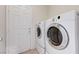 Laundry area with side-by-side washer and dryer at 4078 Blue Manor Ln, North Las Vegas, NV 89032