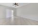 Living room featuring tile flooring and sliding glass doors at 4078 Blue Manor Ln, North Las Vegas, NV 89032
